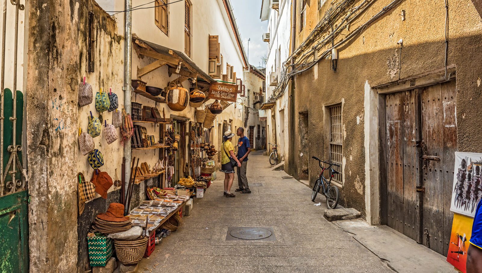 A narrow craft-lined street in Stone Town, Zanzibar